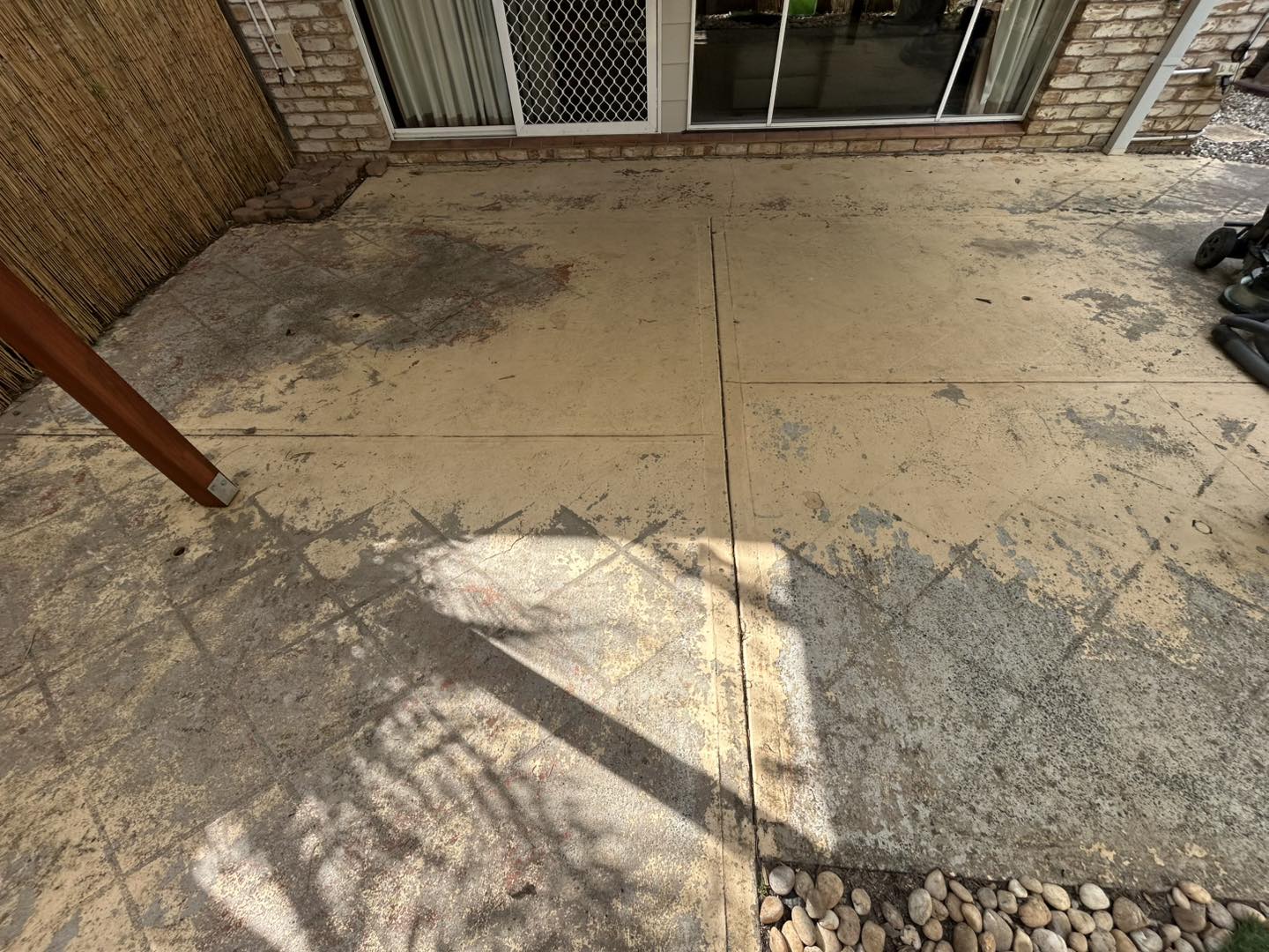Damaged floor area before resurfacing