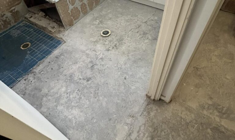Bathroom floor stripped for waterproofing ready for subfloor installation