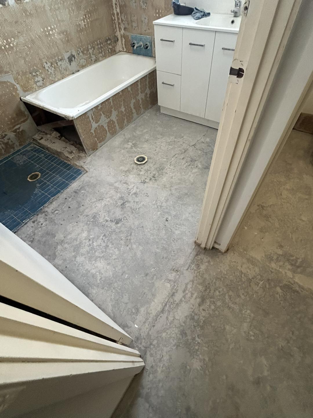 Bathroom floor stripped for waterproofing ready for subfloor installation